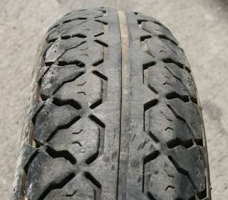  chips in it. Tire should be replaced. Please review pictures carefully