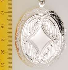 WBM lg. oval engraved locket, tree agate cabochon  