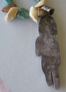 Buddy Lee necklace with fossilized Walrus pendant with coral jet on 
