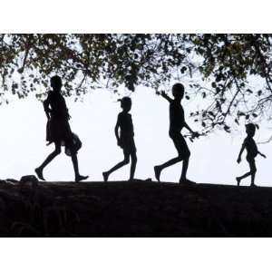 Dassanech Children Walk Along Bank of Omo River in Southwest Ethiopia 