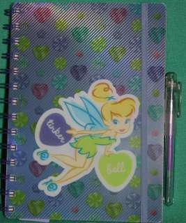   WITH THIS TINKERBELL ASSIGNMENT BOOK PURCHASED FROM DISNEY WORLD