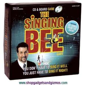    The Singing Bee Board Game with Enclosed Music CD: Toys & Games