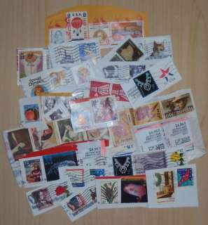 USED US & World Mixed lot of 200 stamps on & off papers  