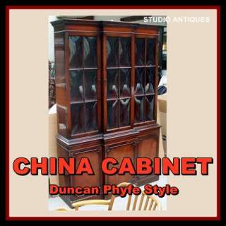   style breakfront China Cabinet with Convex Glass, dating to the 1940s