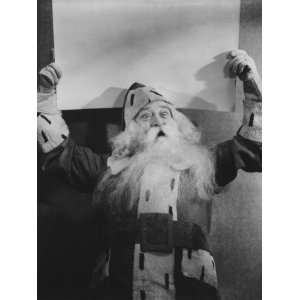 Santa Claus Holding Blank Sheet of Paper Above Head Photographic 