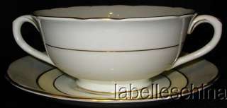 This lovely cream soup bowl and matching saucer is from Coalport 