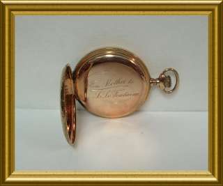 is a Genuine Antique Hunting Case ornately engraved Elgin pocket watch 